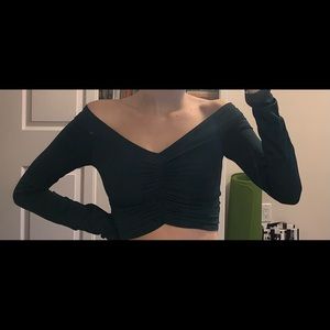 Super cute and flattering ruched top in a forest green colour shown in third pic